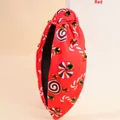 Roter geknoteter Haarreif mit Zuckerstangen-Muster und bunten Strasssteinen - Rot