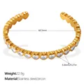 Bracelet jonc ouvert en acier doré avec cœurs en zircone cubique scintillante - Diamètre Intérieur 60.5mm / Or Zircone Cœur Blanc