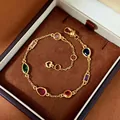 Gold chain bracelet with multicolored teardrop and marquise gems in velvet box - Gold