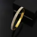 Minimalistische vergulde roestvrijstalen armband met drie rijen fonkelende kristallen - Goud