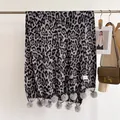 Winter double-sided leopard print scarf with grey pom-pom fringe and brand woven label - 180x68cm / Gray