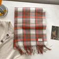 Classic orange and brown plaid tassel scarf made of soft knit fabric in a flat lay view - Gz-173 Orange-red / 192x68cm