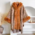 Winter paisley jacquard knit poncho with cozy faux fur trim and bohemian fringe details - Orange