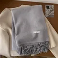 Solid grey wool scarf with fringe and a vintage white woven label on warm coat - 195x65cm / Gray