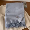 Soft light blue wool scarf with elegant tassel fringe and composition label on coat - 195x65cm / Sky Blue