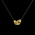 Polished gold double handcuff pendant necklace in titanium steel on black background - Gold