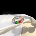 Macro shot of S925 sterling silver stamp on rainbow zircon eternity ring band - US 6 / Baguette Rainbow Zirconia