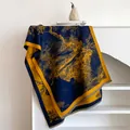 Detail of navy and yellow ink painting scarf with fringe on a white bookshelf - Dark Blue