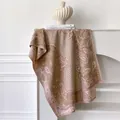 Detail of paisley pattern and pink fringe on vintage pashmina scarf with soft texture - 185x65cm / Camel