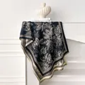 Detail of tropical plant jacquard cashmere shawl with houndstooth edge and fine fringe - Black