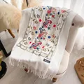 White cashmere shawl with colorful floral paisley embroidery and elegant fringe - White
