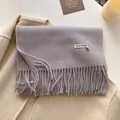 Folded lavender cashmere-like scarf with tassels and 10% wool blend material - 211x31cm / Light Purple
