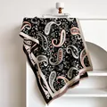 Schwarzer Kaschmir-Schal mit Paisley-Muster in Türkis und eleganten Fransen - Schwarz