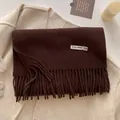 Dark brown wool blend scarf with fringe detail on beige knit background - 211x31cm / Coffee