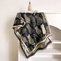 Close-up of modern abstract cat pattern jacquard shawl with decorative tassels - 185x65cm / Black