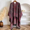 Detailed close-up of retro paisley pattern and fringe hem on the bohemian style cape shawl - Bxs-452 Dark Red / 145x130cm
