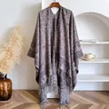 Detailed view of paisley patterns and long fringe on an elegant bohemian shawl - 145x130cm / Lavender Purple (BXS-462)