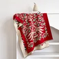 Detail of red floral cashmere-feel scarf featuring vintage jacquard pattern and fringes - Red / 185x65cm