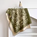 Detail of floral tree jacquard pattern on olive green and cream cashmere-feel scarf - Army Green / 185x65cm