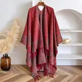 Close-up of ethnic red paisley jacquard shawl with thick fringe tassels on wooden hanger - Tops / 145x130cm / Red (BXS-437)