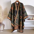 Detail of bohemian floral poncho with sunflower pattern and orange embroidery edges - Olive Green