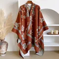 Detail of rust-red floral knit poncho featuring bohemian embroidery and handmade edges - Tops / 130x152cm / Red Brown
