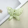 Green butterfly hair claw clip with cracked marble pattern and sturdy metal spring - Green