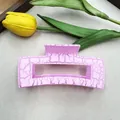 Pink rectangular hair claw clip with a stylish crackle pattern and marble finish - Pink