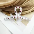 Molla per capelli in acrilico bianco con cuori rossi e piccoli fiocchi neri - Modello Incrocio Quattro