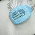 Pinza per capelli ovale piatta azzurra con finitura con motivo a crepè unico - Ellisse piatta / Celeste
