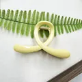 Minimalist cream yellow hair claw clip with elegant twist design for women - Cross Yellow