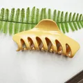 Ginger yellow hollow hair claw clip with glossy finish for thick hair styling - Sawtooth-Orange Yellow