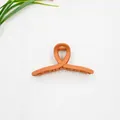 Molla per capelli arancione terracotta opaca con un design a torsione minimalista - Arancione