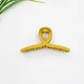 Molla per capelli giallo senape opaco con design a incrocio per acconciature a coda - Giallo Terra