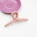 Pince à cheveux rose mat au design de bulles torsadées pour un style élégant féminin - Rose