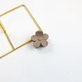 Matte brown five-petal flower hair claw clip with a frosted resin finish for styling - Brown