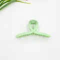 Pinza per capelli grande verde menta opaco con design a torsione per coda alta - verde chiaro