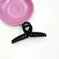 Matte black oversized hair claw clip featuring a stylish beaded edge minimalist design - Black
