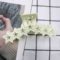 Star-shaped macaron yellow hair claw clip in a matte cream finish for women - Milky White