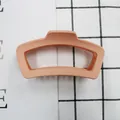 Pinza per capelli geometrica rosa pesca opaca con design a trapezio cavo e presa forte - Arancione Corallo