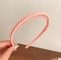 Cerchietto rosa antiscivolo con trama intrecciata e denti per acconciature - Rosa Intrecciato