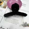 Plush faux fur claw clip in deep black, perfect for autumn winter hair styling - Black