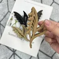 Matte Maiglöckchen-Haarklammern in Schwarz, Khaki und Braun mit Holzmaserung - Dunkelbraun