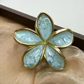 Pinza per capelli a fiore blu con bordo dorato e texture marmorea per acconciature - Fibbia Fiore Crepata / Blu Lago