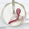 Pince à cheveux nœud transparent avec rubans rouges et roses et ressort doré - Rouge + Blanc