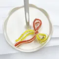 Pince à cheveux noeud avec motifs de vagues jaune et orange sur acrylique transparent - Orange + Jaune