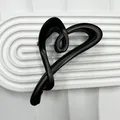 Matte black heart-shaped hair claw clip with elegant hollow minimalist design - Matte Black