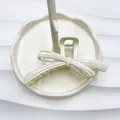 Elegant cream white oversized bow hair claw clip with a matte finish for thick hair - Bright White