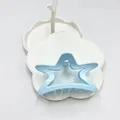 Light blue hollow star hair claw clip with glossy finish for elegant hairstyling - Sky Blue Star Print