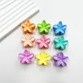 Set of nine colorful candy-colored flower hair clips in a organized 3x3 grid layout - Plumeria (Mixed Colors)